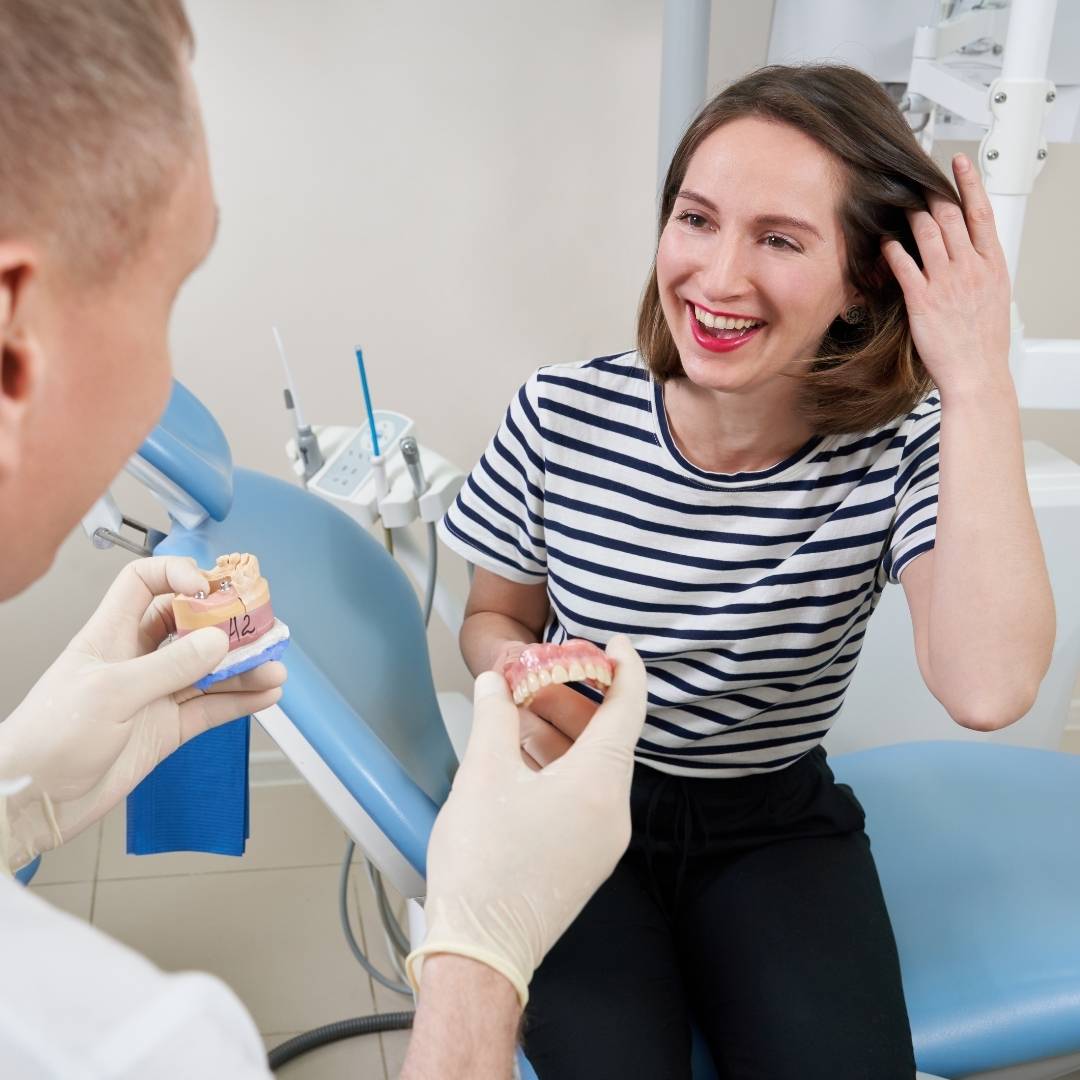 A smiling patient with dental implants